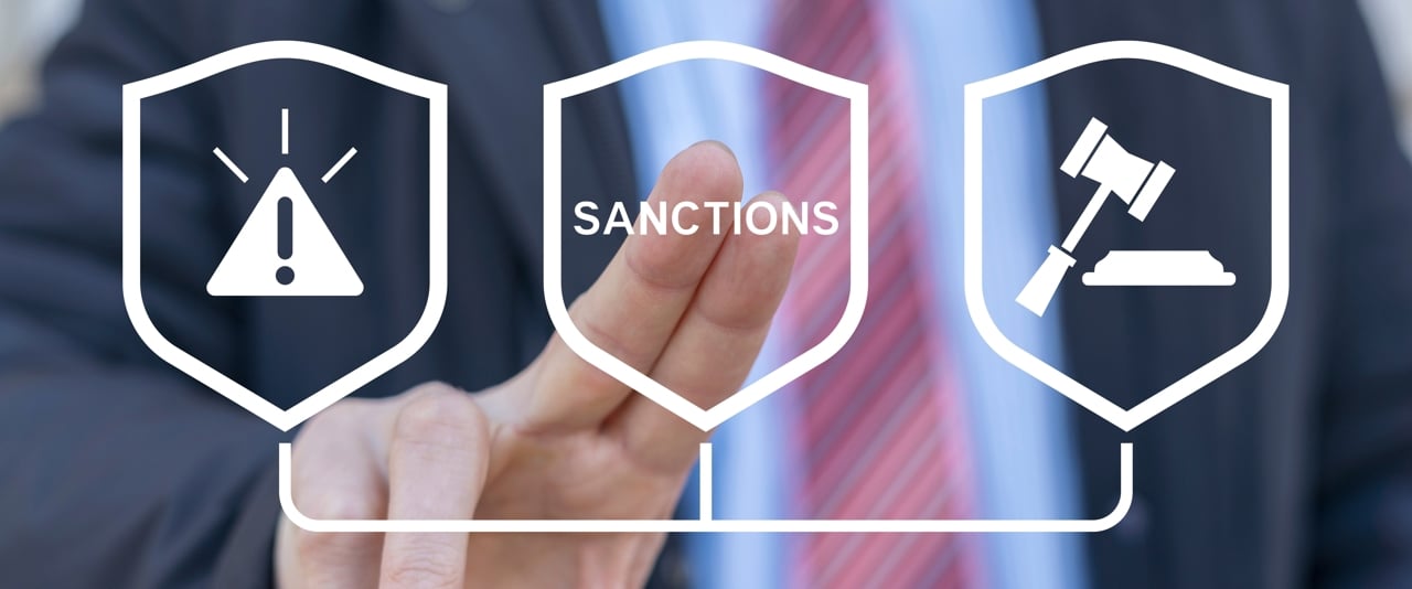 business man touching virtual sanctions