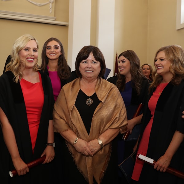 Former Tánaiste Mary Harney surrounded by new solicitors
