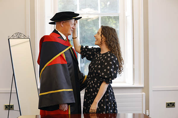 Chief Justice Donal O'Donnell receives an Honorary Doctorate from Dublin City University, admired by his daughter Aoife