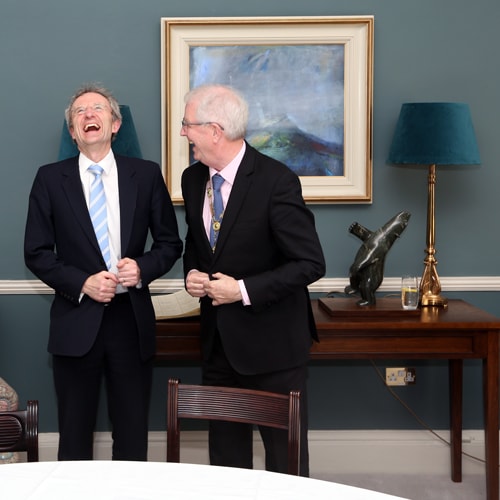 Mr Justice Michael Twomey shares a joke with Law Society President Michael Quinlan