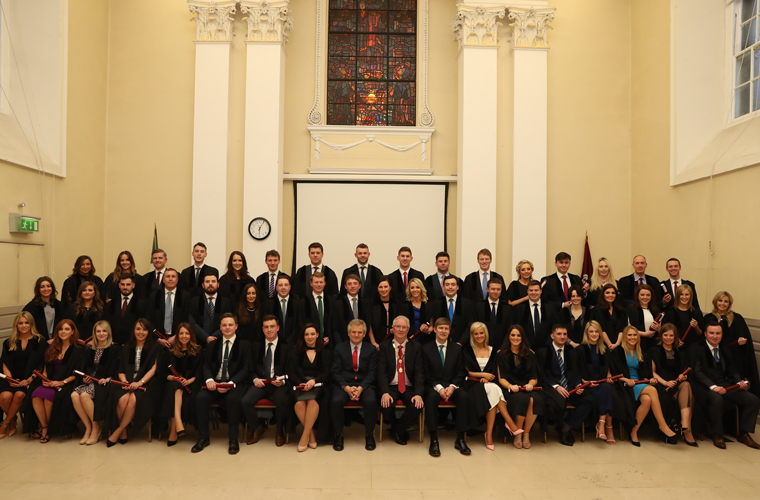 Mr Justice Michael White, Law Society President Michael Quinlan and Law Society Director General Ken Murphy with new solicitors in the Presidents’ Hall on 14 March, 2018