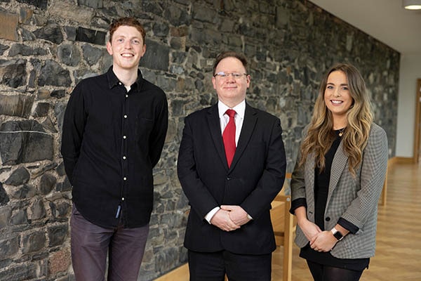 Luke McGivern (A&L Goodbody) and Alannah Short (LK Shields) with Education Committee chair Richard Hammond SC