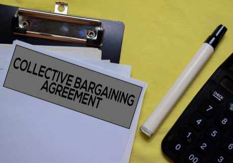 Pledge to review law on collective bargaining