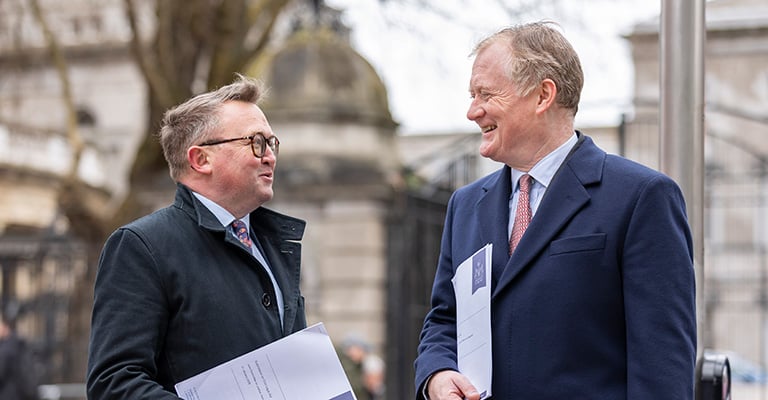Dr Brian Hunt, Law Society Director of Policy, in conversation with a Law Society expert at Leinster House