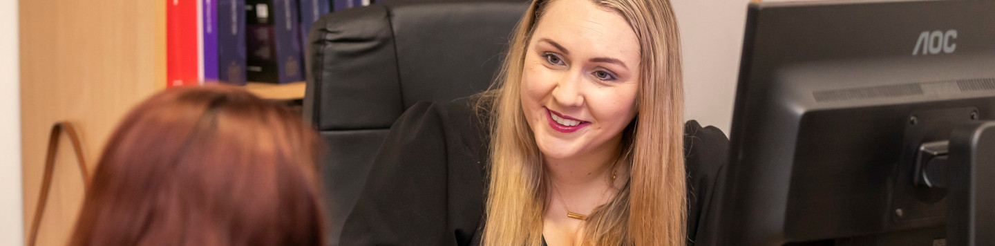 Solicitor working in-house client consultation